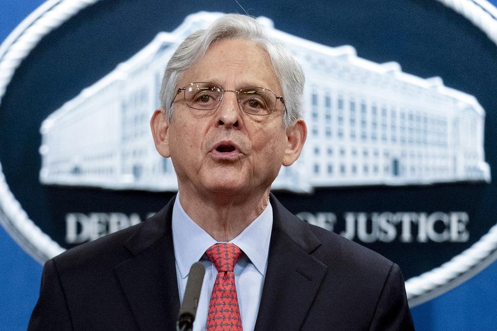 Attorney General Merrick Garland speaks at a news conference at the Department of Justice in Washington, August 5, 2021.